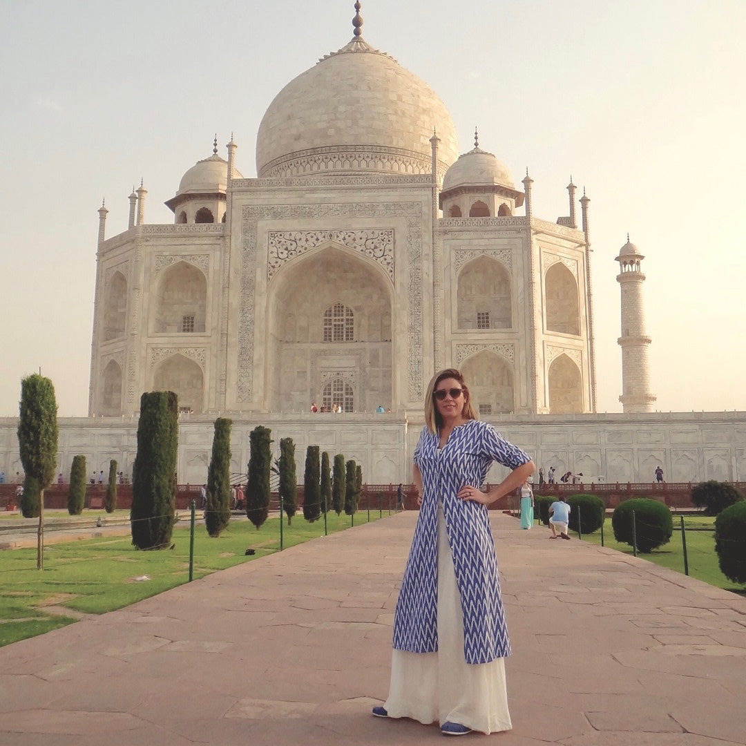 Valeria on her travels standing in front of the Taj Mahal