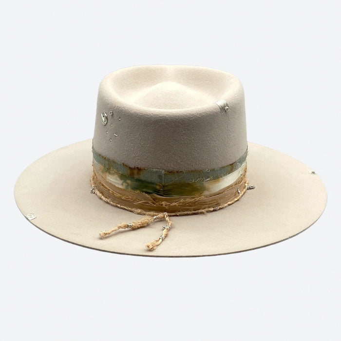 Bone, sage and butter colours come together in this stylish felt fedora hat with silk trimmings and gold details. Handmade by Valeria Andino